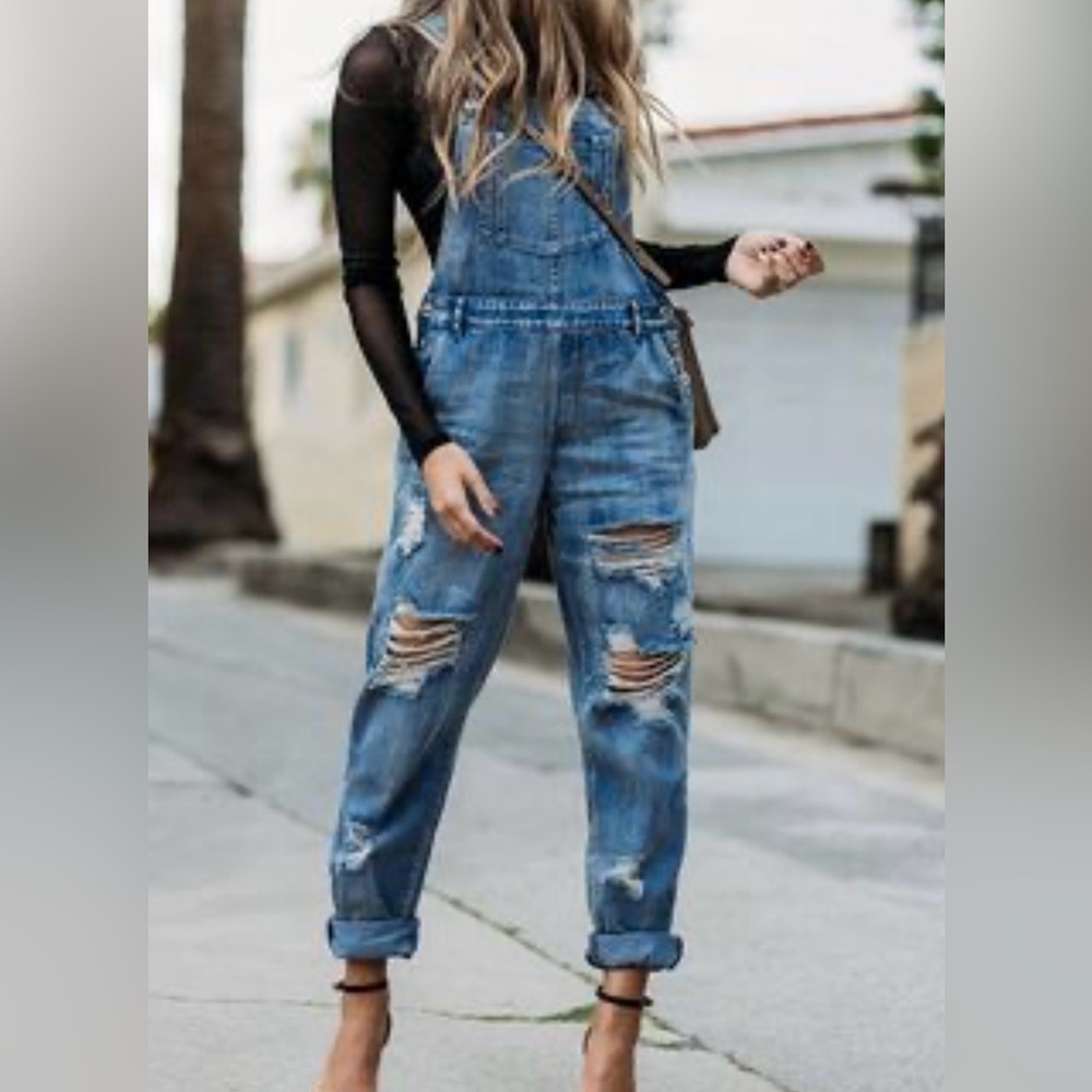 Eunina-Dylan skinny overalls.Med wash.6 pockets.Manufactured destressing .Size M